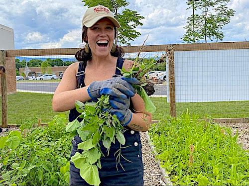 Taylor Alger in the community garden at PMH