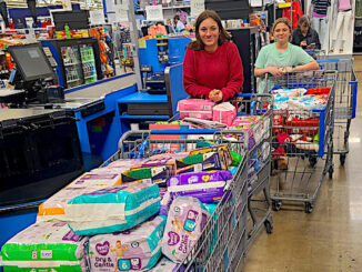 Addison Carney, 7th grade (green shirt); Madison Eavey, 8th grade (red sweater)